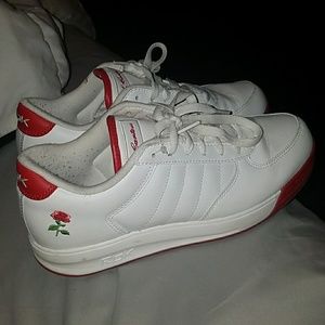 white sneaker with red detailing